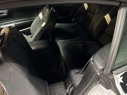 Rear seating area inside Ford Mustang Shelby convertible available for hire in Alicante