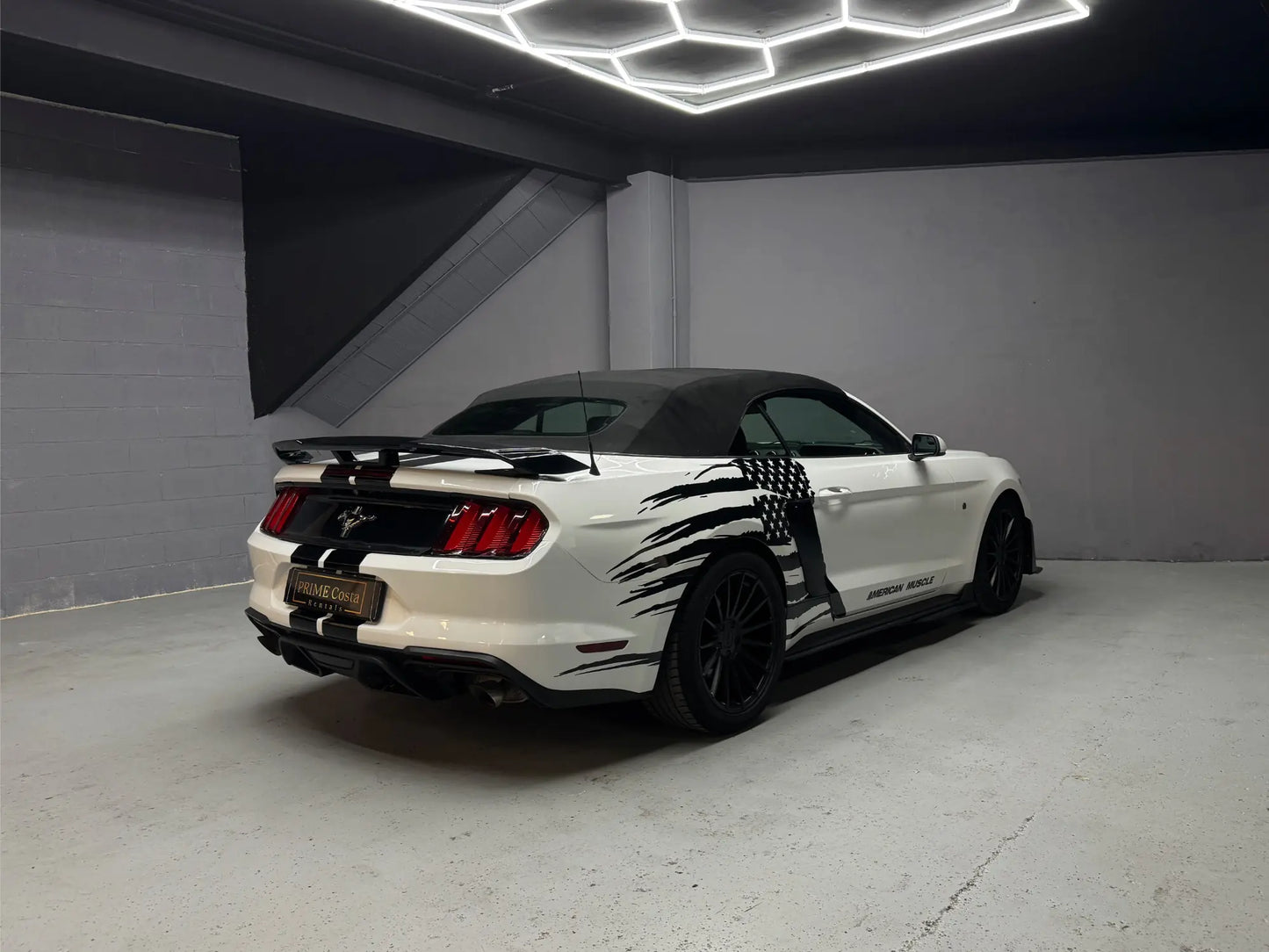 Rear view of Ford Mustang Shelby convertible luxury rental car in Benidorm