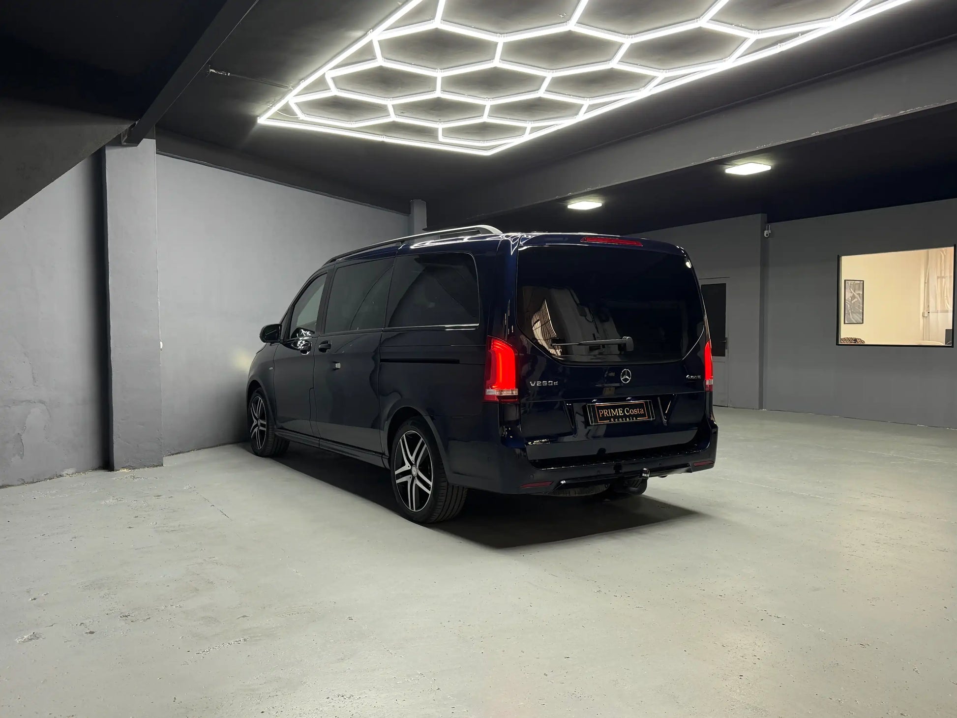 Blue Mercedes Benz V250 rear left side pictures in the garage
