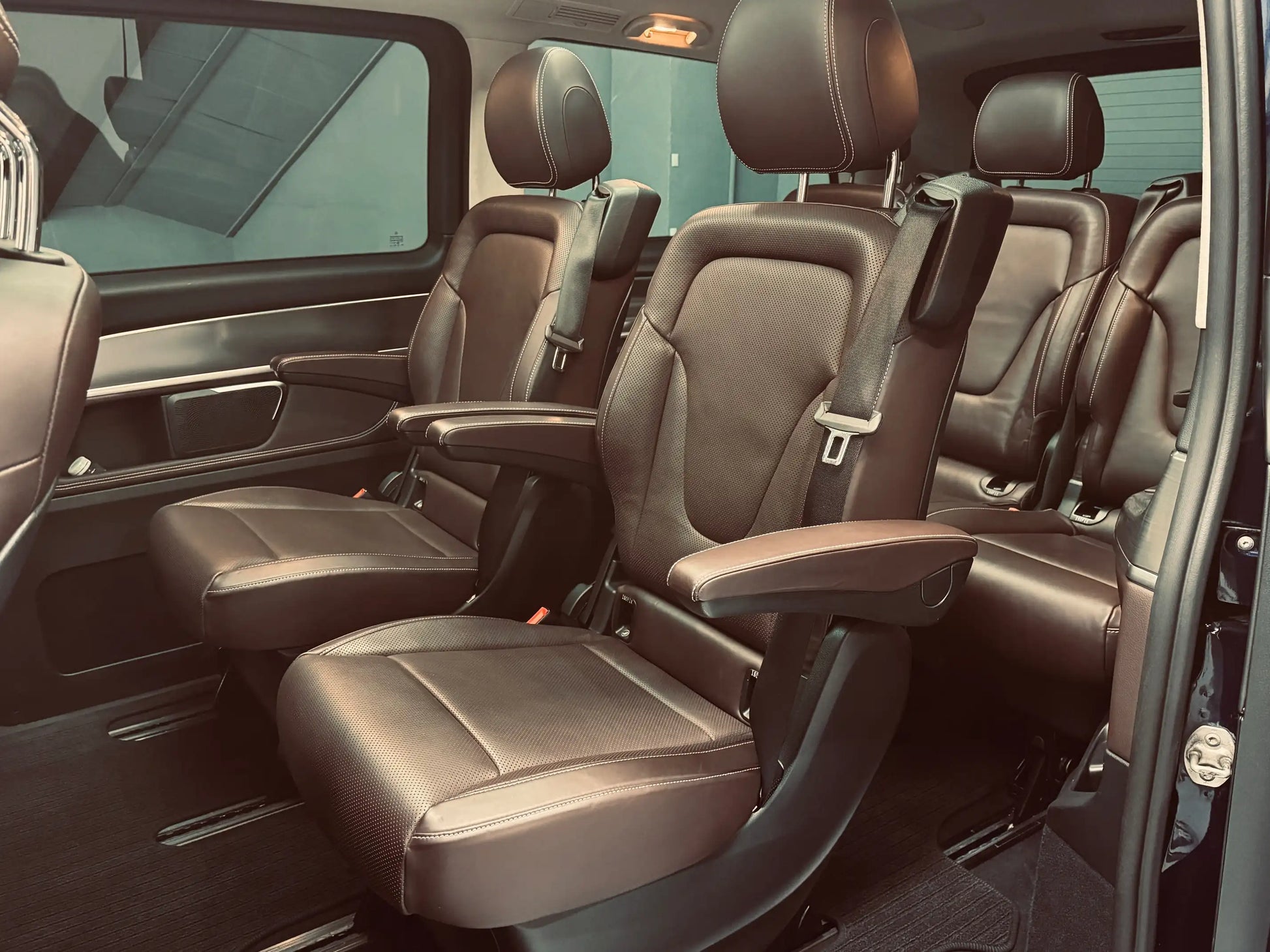 Rear passenger seating in Mercedes V-Class V250 with individual leather seats and generous legroom