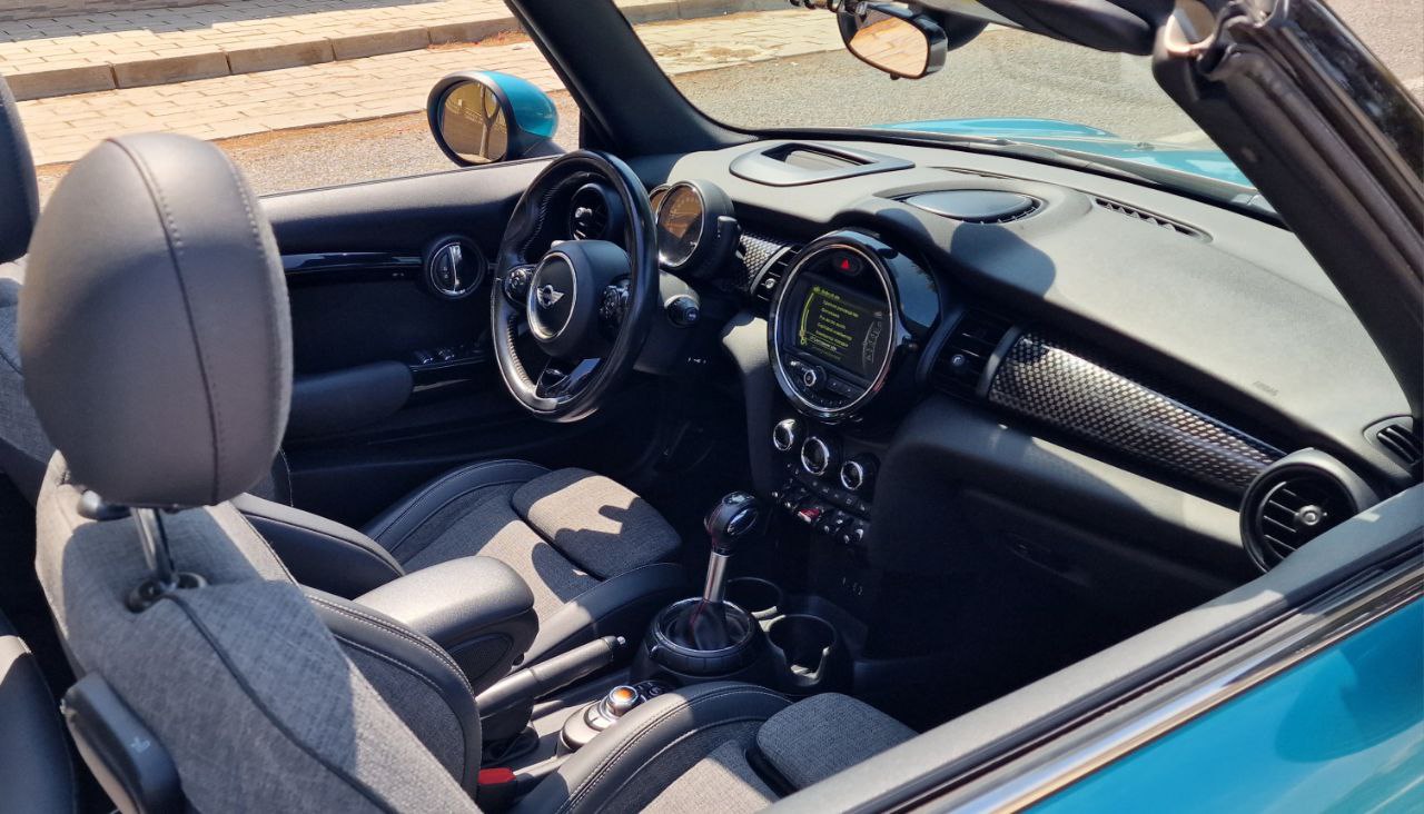 Mini Cooper Cabrio convertible for rent in Alicante – compact city car, stylish design, open-top driving.