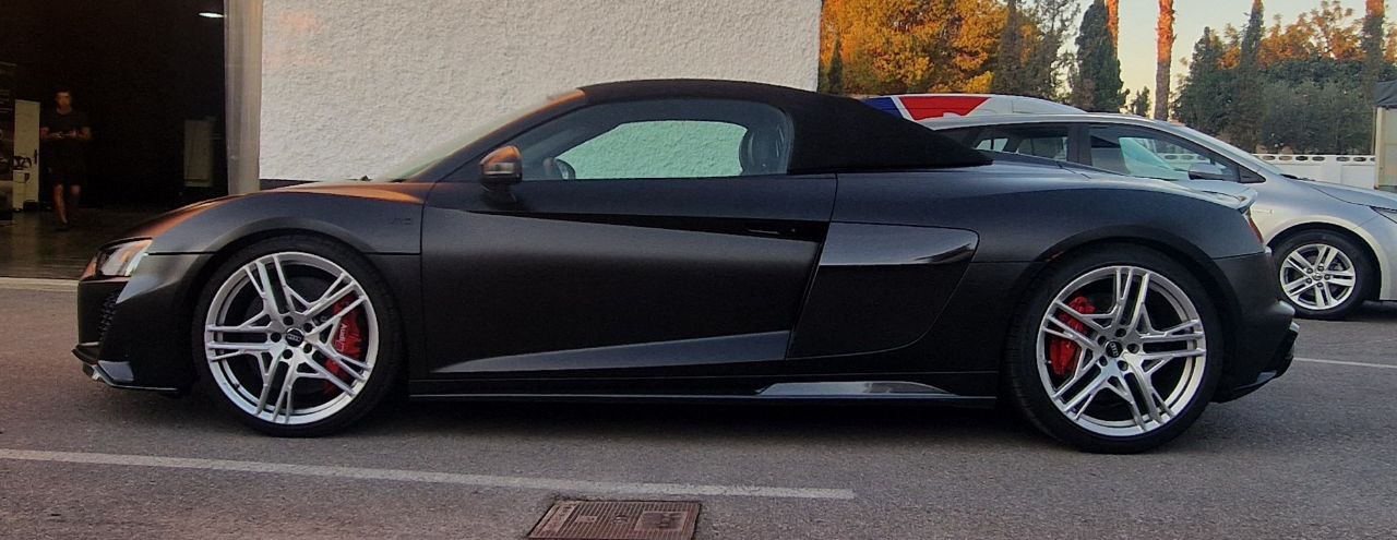 Audi R8 Cabriolet luxury convertible for rent in Alicante – V10 supercar, automatic transmission, open-top driving.