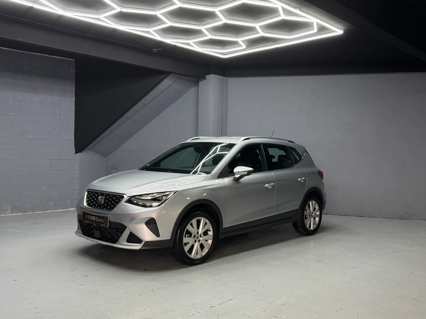 Seat Arona compact SUV photographed in indoor studio