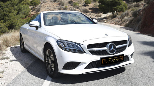 Mercedes-Benz C 200 Cabrio luxury convertible for rent in Alicante – stylish design, premium comfort, retractable roof.
