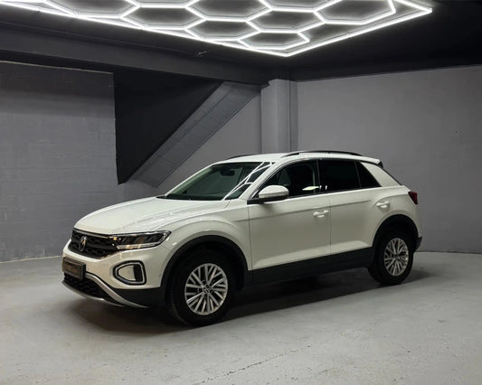 Volkswagen T-Roc white SUV side view affordable rental Alicante
