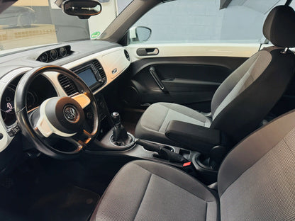 VW Beetle Kafer black interior view with visible dashboard and steering wheel